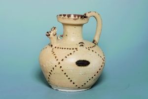 晋青釉褐彩鸡首壶赏析