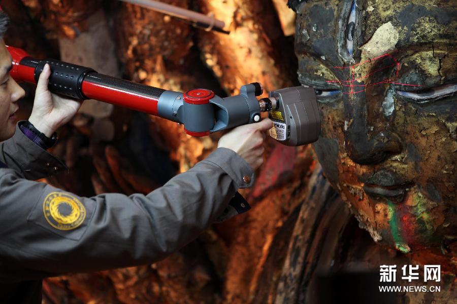 #（新华网）（2）金光再现——重庆大足千手观音修复纪实