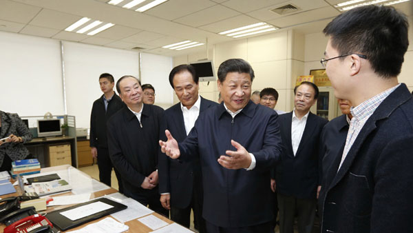 习近平到新华社调研