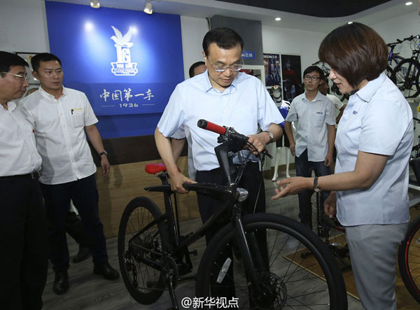 李克强愿为中国自行车做广告