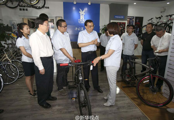 李克强愿为中国自行车做广告