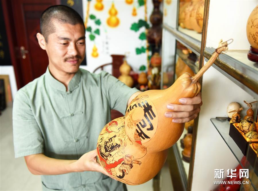 （晚报）（2）小葫芦上的精彩世界