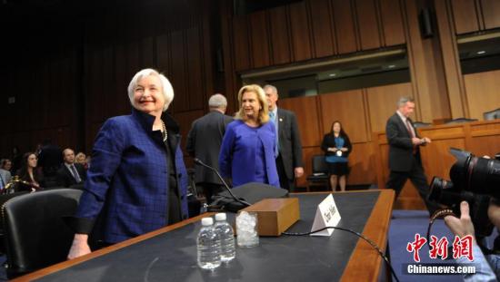 美联储加息触发金融市场强烈反应 人民币中间价跌