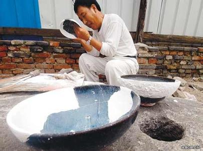 沈阳发现2000年前古城 出土大量陶器铜器