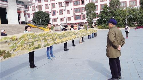 夫妻俩5年绘制刺绣22米长《清明上河图》