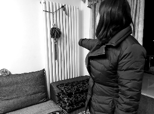 供暖两周 业主家中穿棉服
