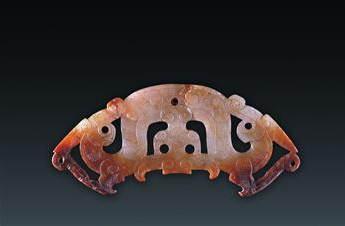 玉透雕双夔龙纹佩